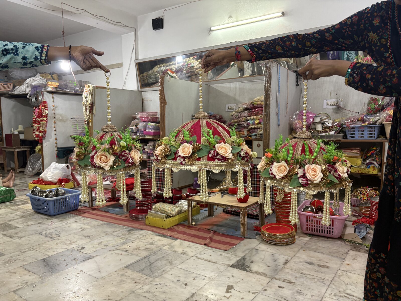 Three-tier velvet chattar styled at the temple